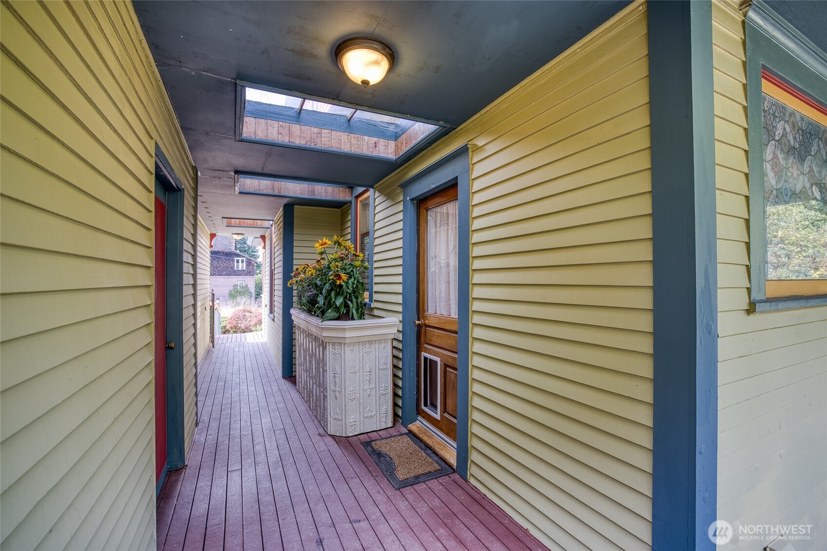 209 Ferry Street South Bend, WA 98586 - Photo 23 of 39 a view of a porch with wooden floor