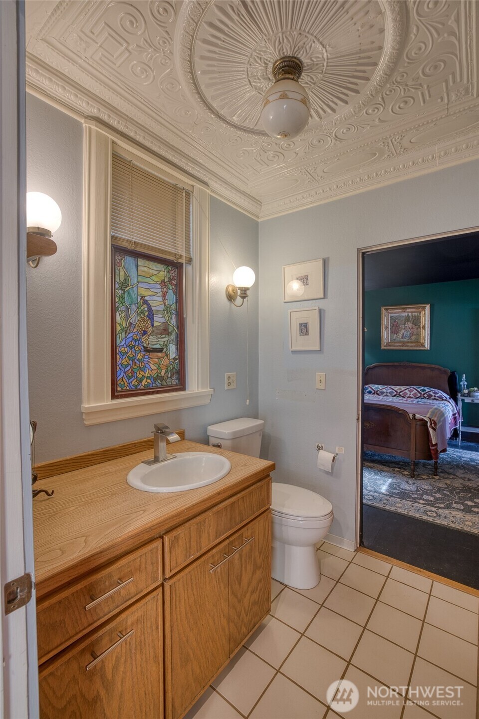 209 Ferry Street South Bend, WA 98586 - Photo 24 of 39 a spacious bathroom with a sink a toilet and a mirror
