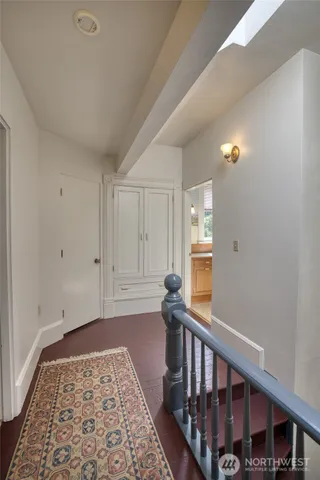 a bedroom with a bed and a table in it