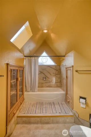 a view of a city with lots of potted plants