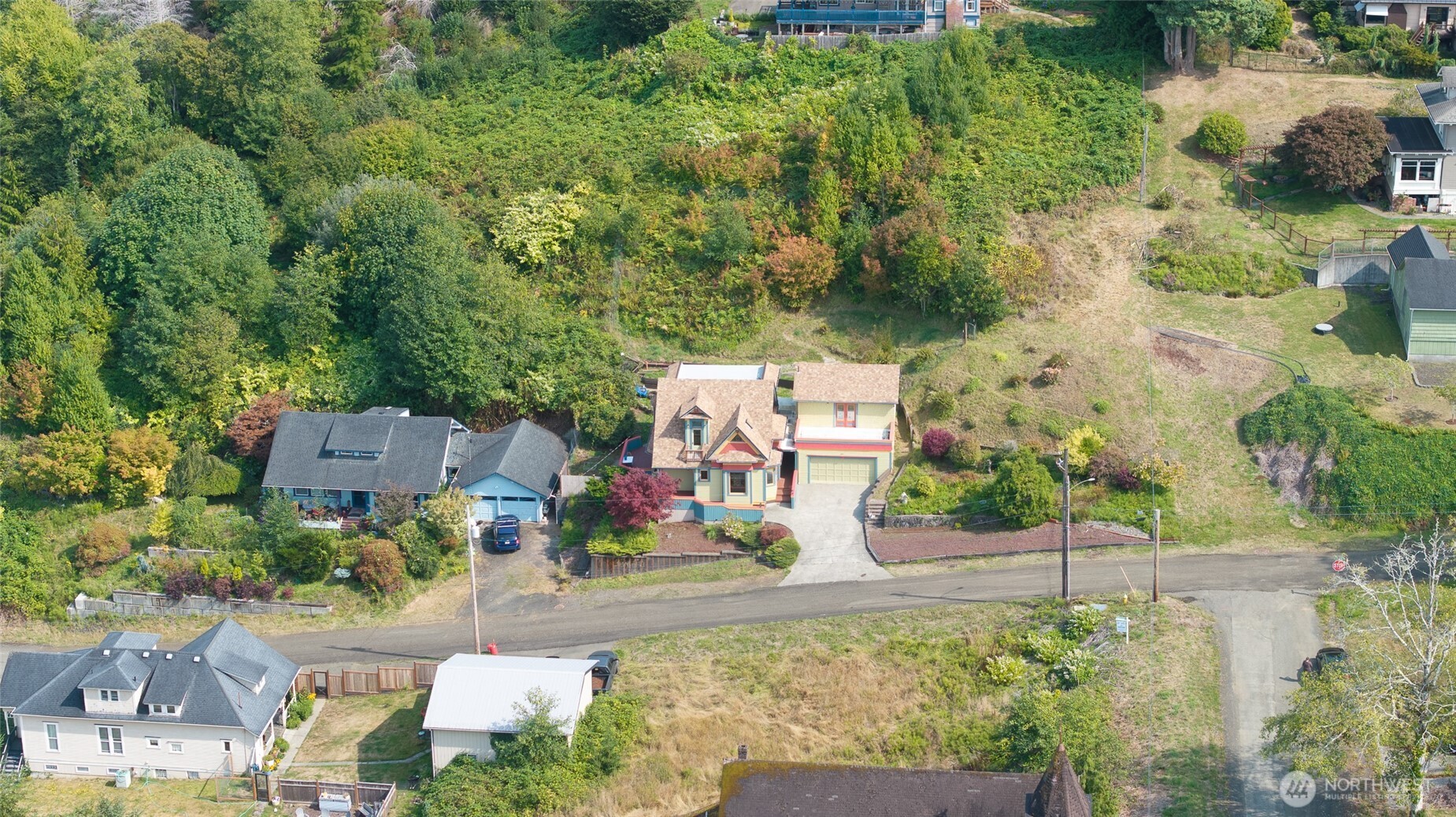 209 Ferry Street South Bend, WA 98586 - Photo 36 of 39 an aerial view of a house with a yard and garden