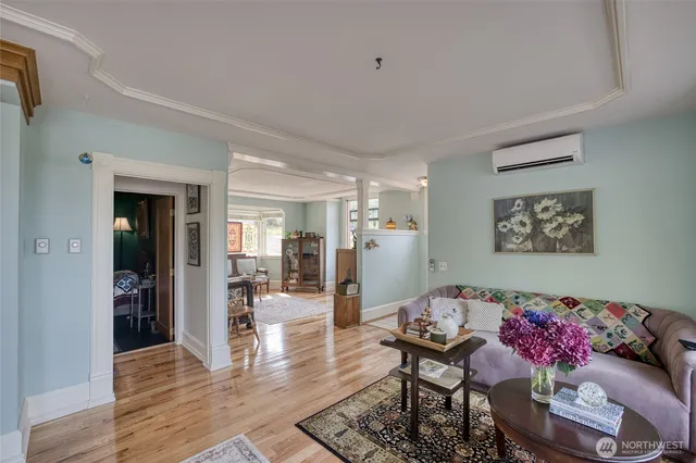 a living room with furniture and a window