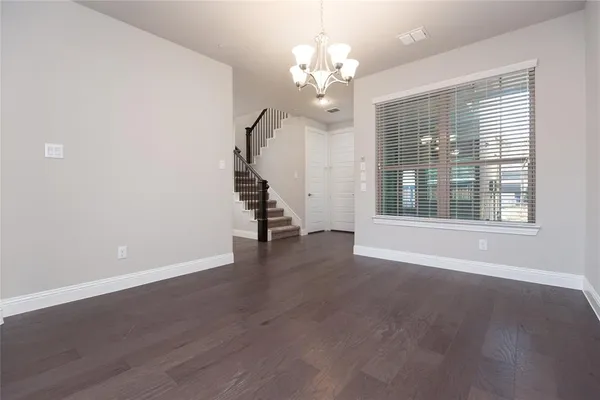 a view of livingroom with hardwood floor and window