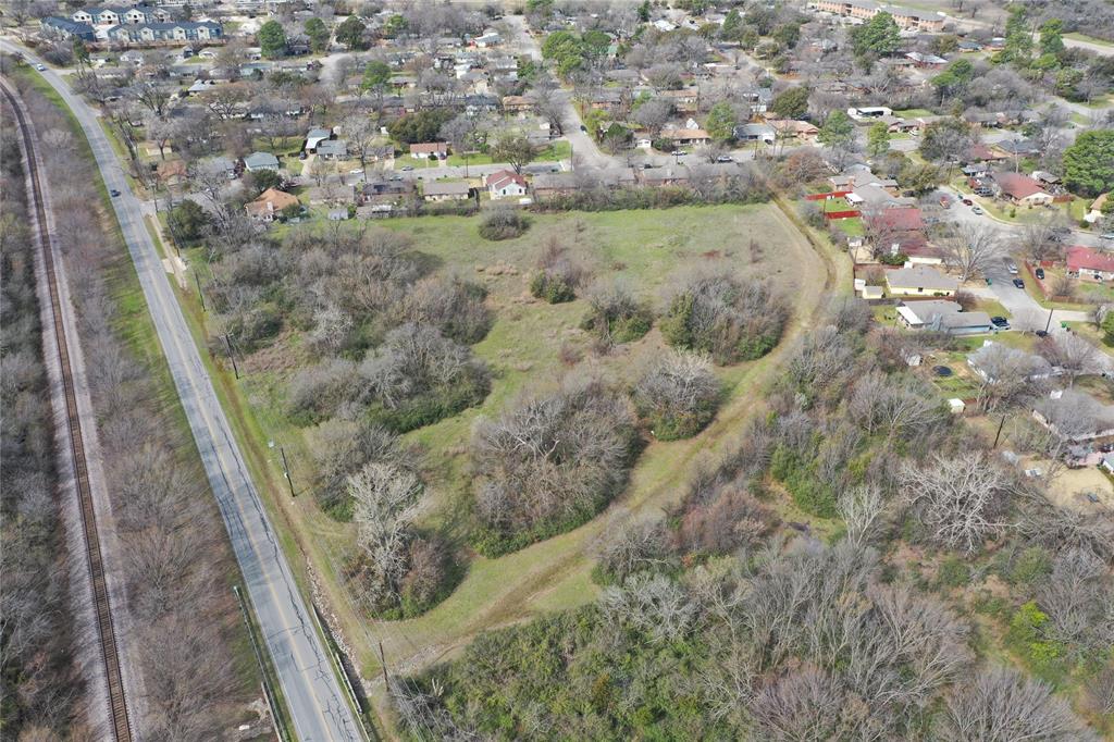 1902 Kiowa Road Denton, TX 76209 - Photo 3 of 3 Aerial view of property and surrounding area featuring nearby suburban area
