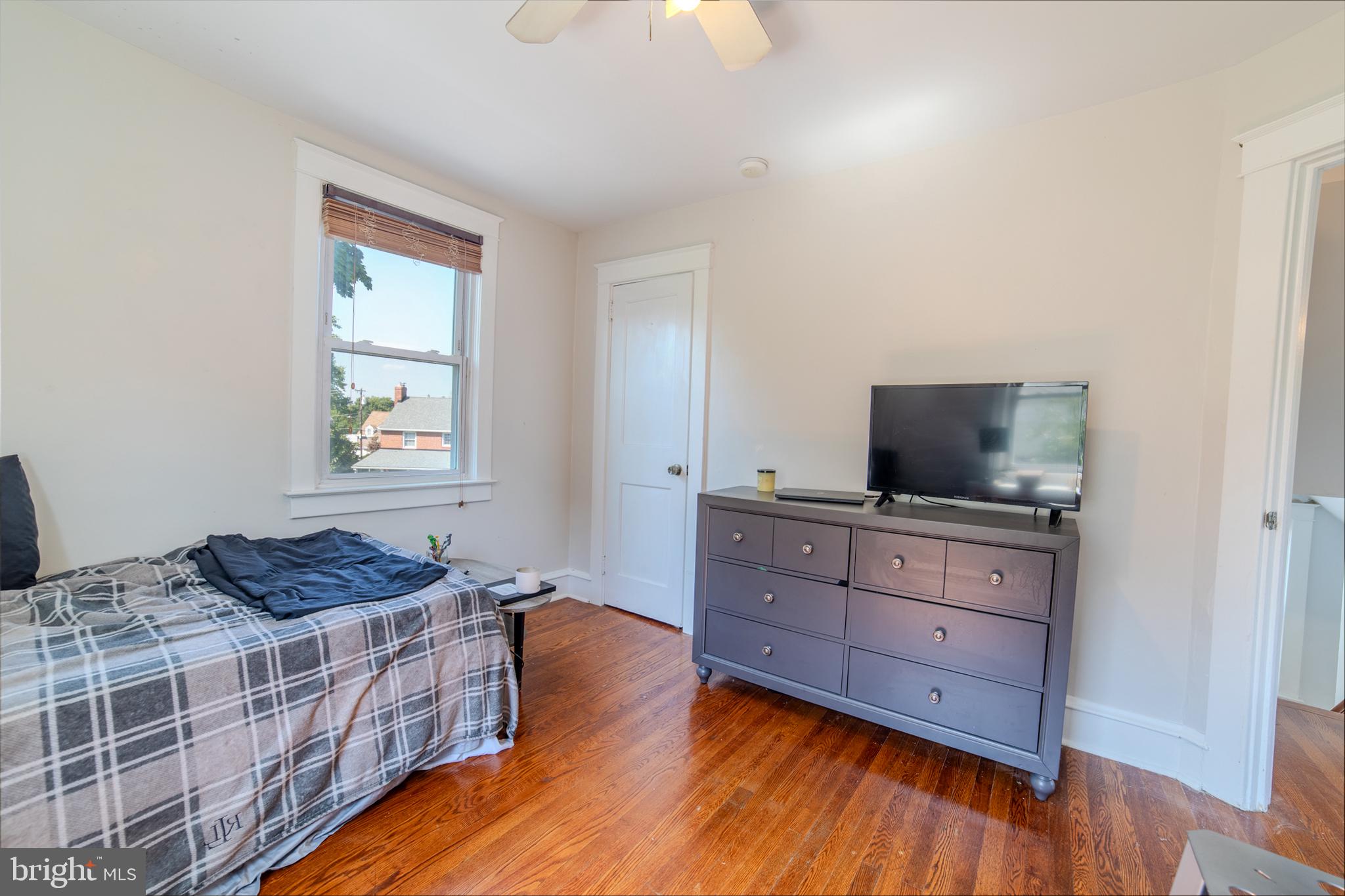 162 South Eagle Road Havertown, PA 19083 - Photo 17 of 30 a bedroom with a bed and flat screen tv