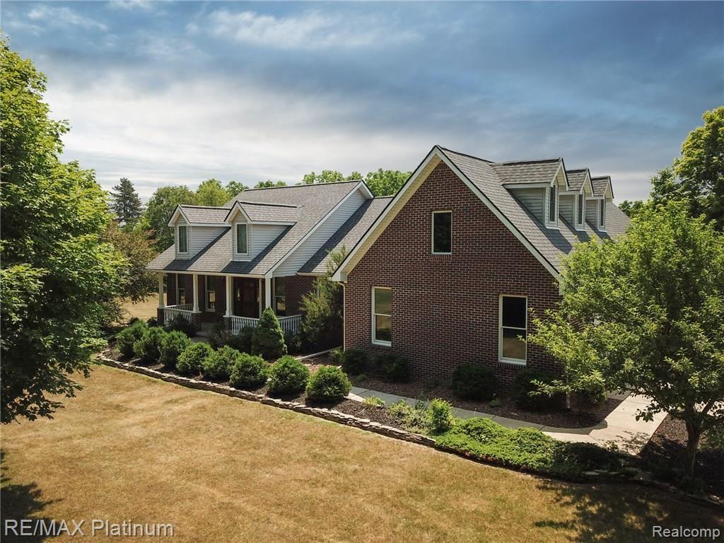 125 Keddle Road Howell, MI 48843 - Photo 2 of 35 Beautiful Brick Ranch With Big Welcoming Porch