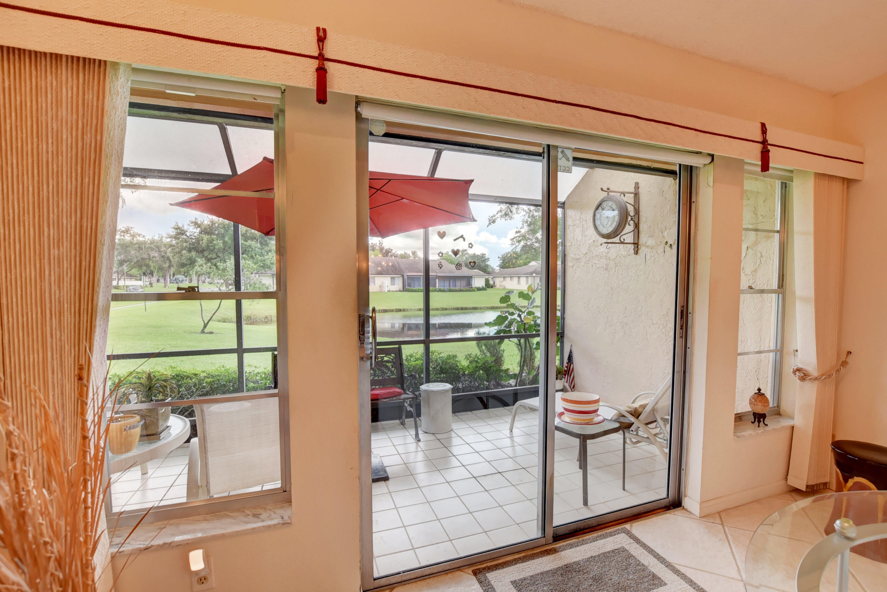 8940 Meadowlark Way, Unit A Boca Raton, FL 33496 - Photo 8 of 53 View of Serene Lake