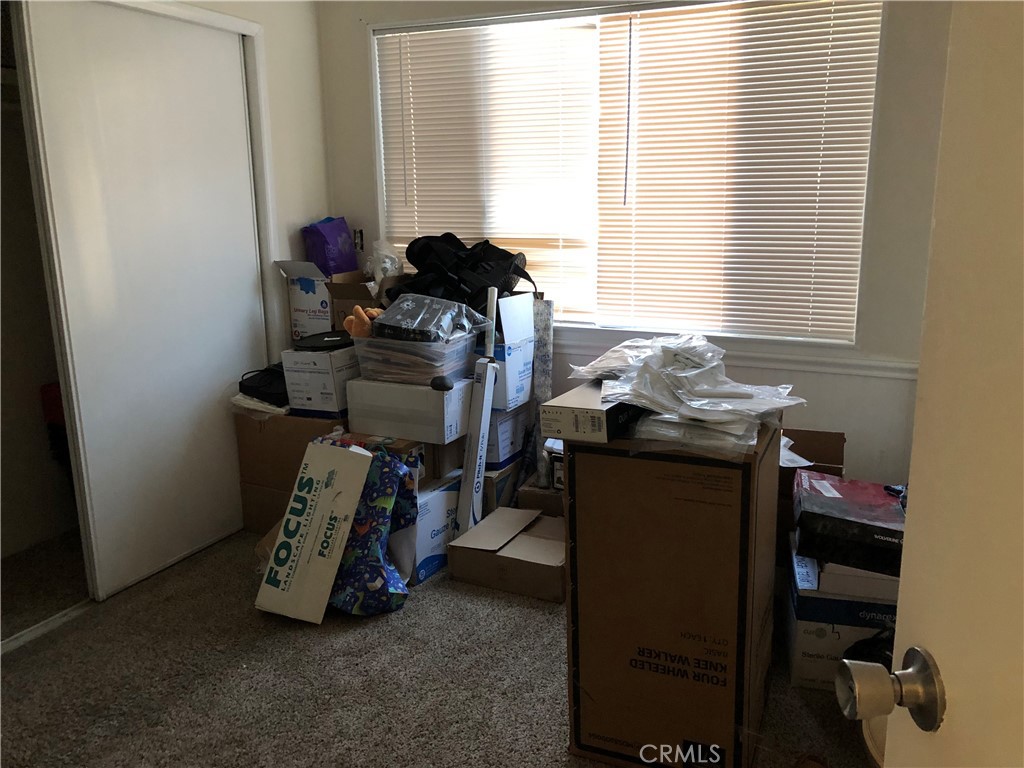 4901 Green River Road, Unit 113 Corona, CA 92878 - Photo 14 of 22 a room with musical instruments