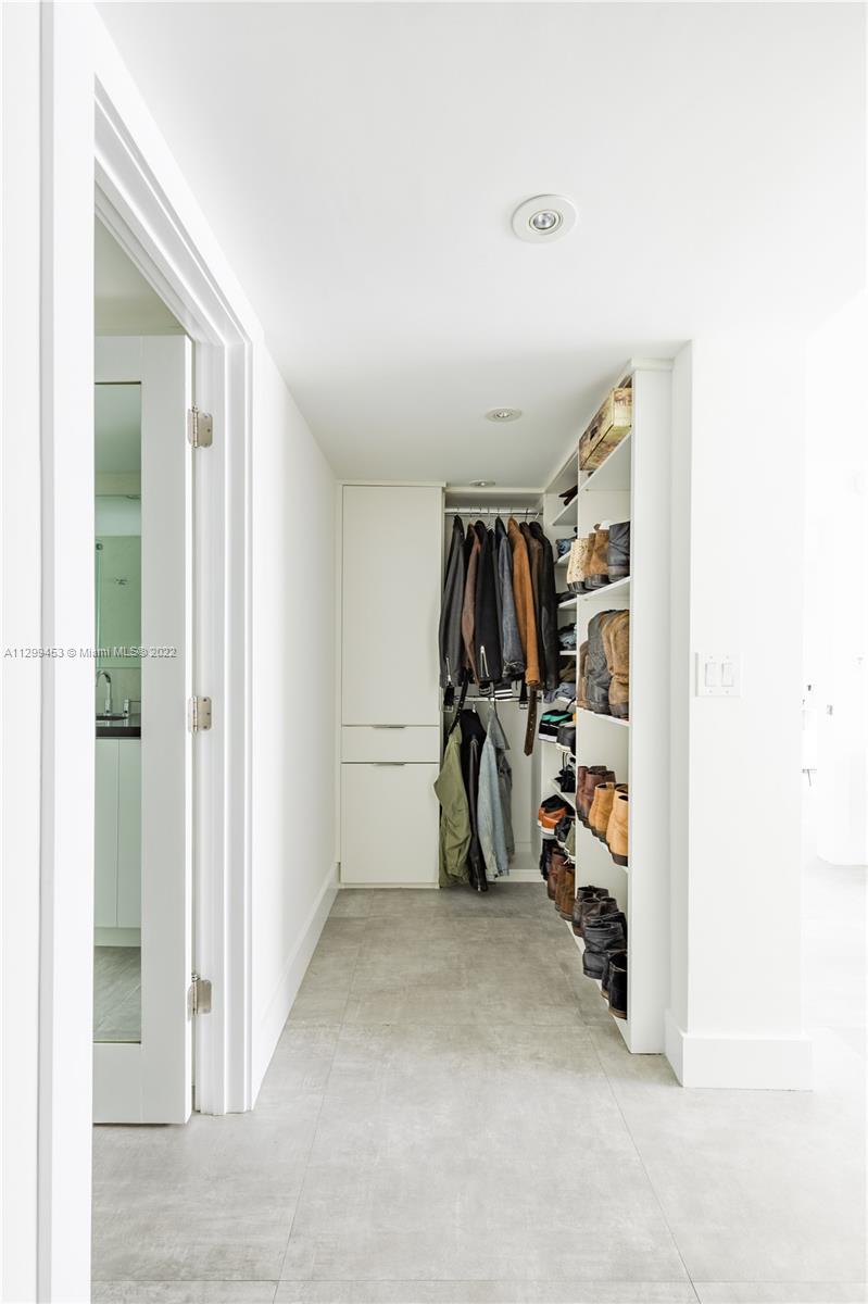 1674 Bay Road, Unit 504 Miami Beach, FL 33139 - Photo 9 of 10 a view of a room with gym equipment