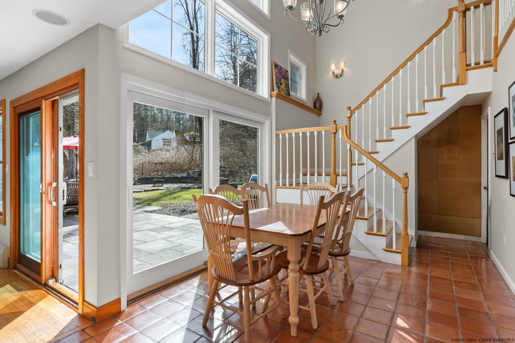 108 Ratterman Road Woodstock, NY 12498 - Photo 14 of 29 a view of a room with lots of furniture and large windows