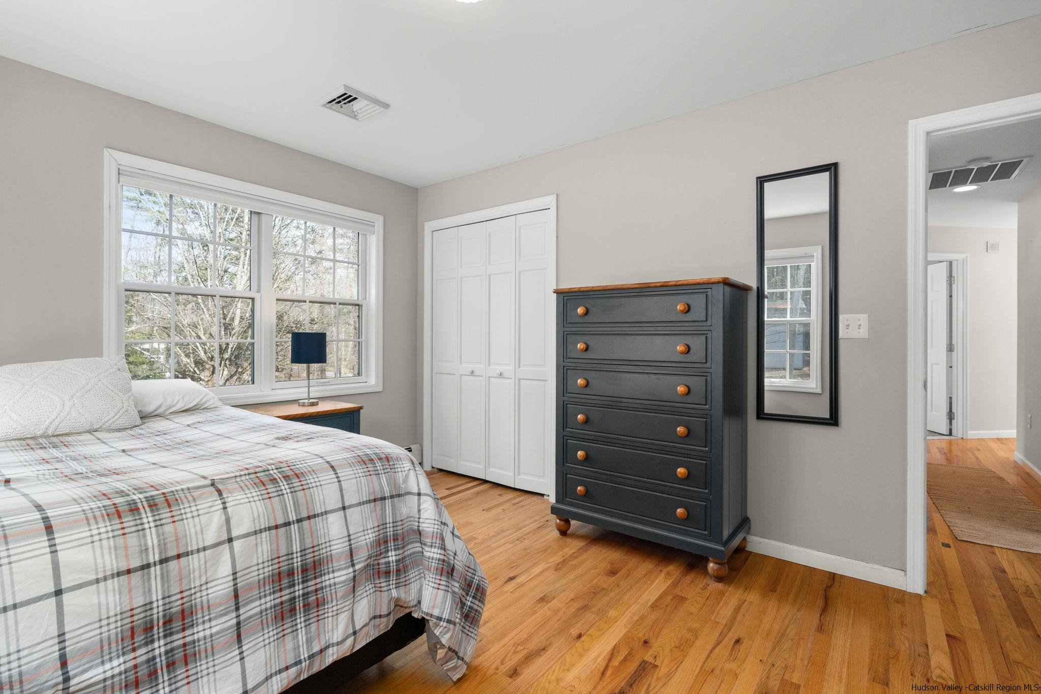108 Ratterman Road Woodstock, NY 12498 - Photo 18 of 29 a bedroom with a bed and a dresser