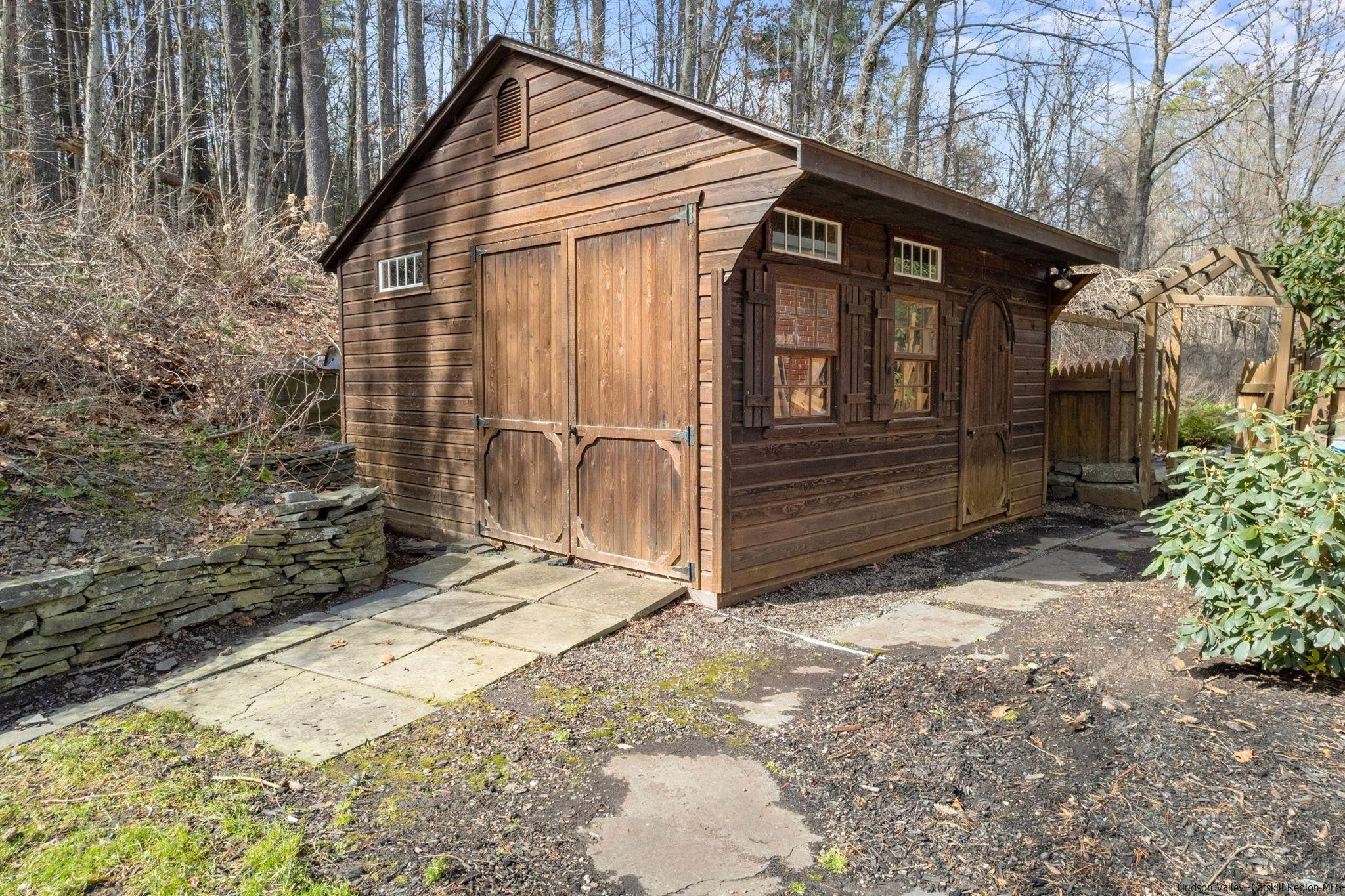 108 Ratterman Road Woodstock, NY 12498 - Photo 28 of 29 a front view of a house with a yard
