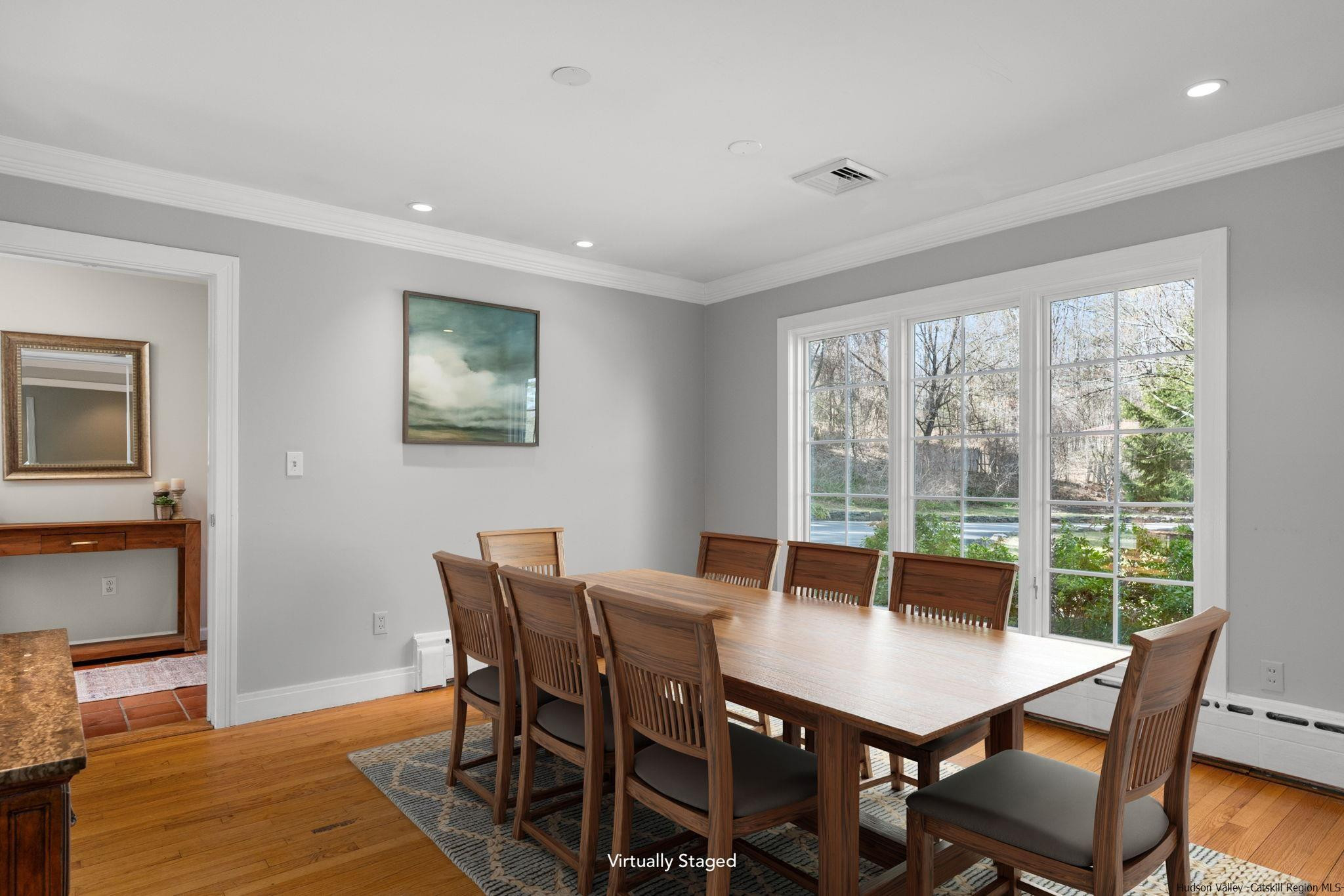 108 Ratterman Road Woodstock, NY 12498 - Photo 9 of 29 a view of a dining room with furniture window and wooden floor
