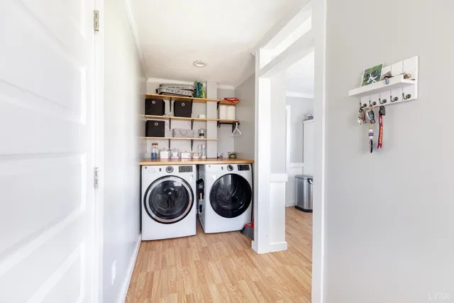 a view of an entryway with wooden floor