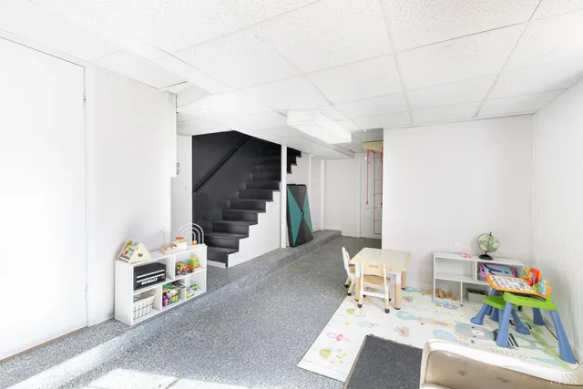 a bathroom with a sink and toilet