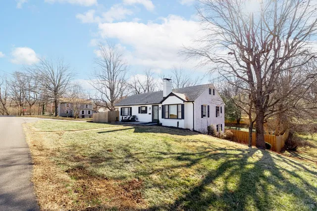 an aerial view of residential house with outdoor space