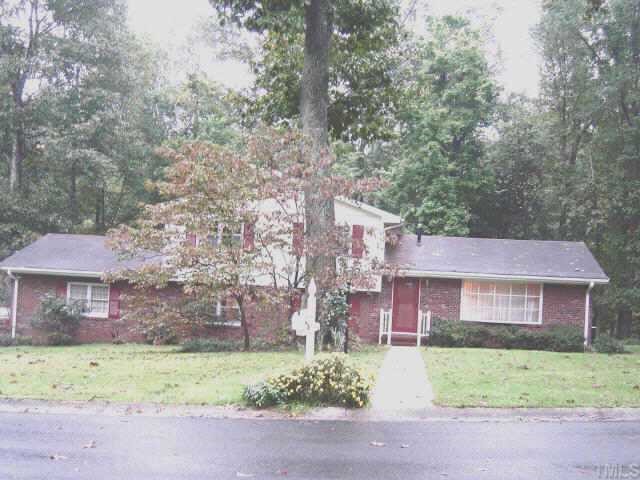 1714 Medfield Road Raleigh, NC 27607 - Photo 1 of 1 a front view of a house with a yard and garage