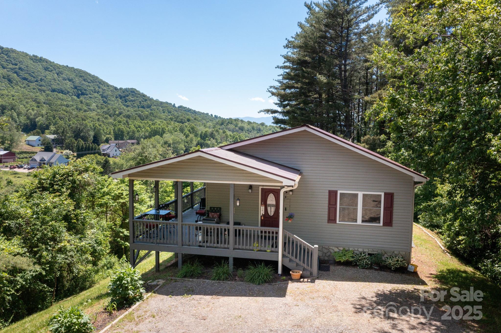 174 Diamond Point Canton, NC 28716 - Photo 28 of 30 a front view of a house with garden