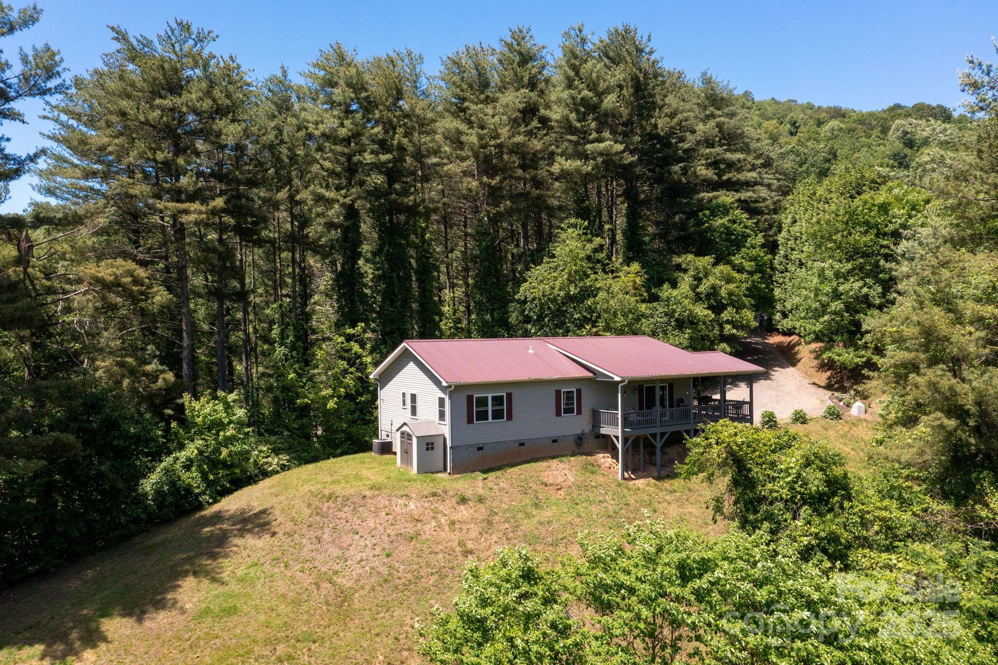 174 Diamond Point Canton, NC 28716 - Photo 3 of 30 a front view of a house with garden