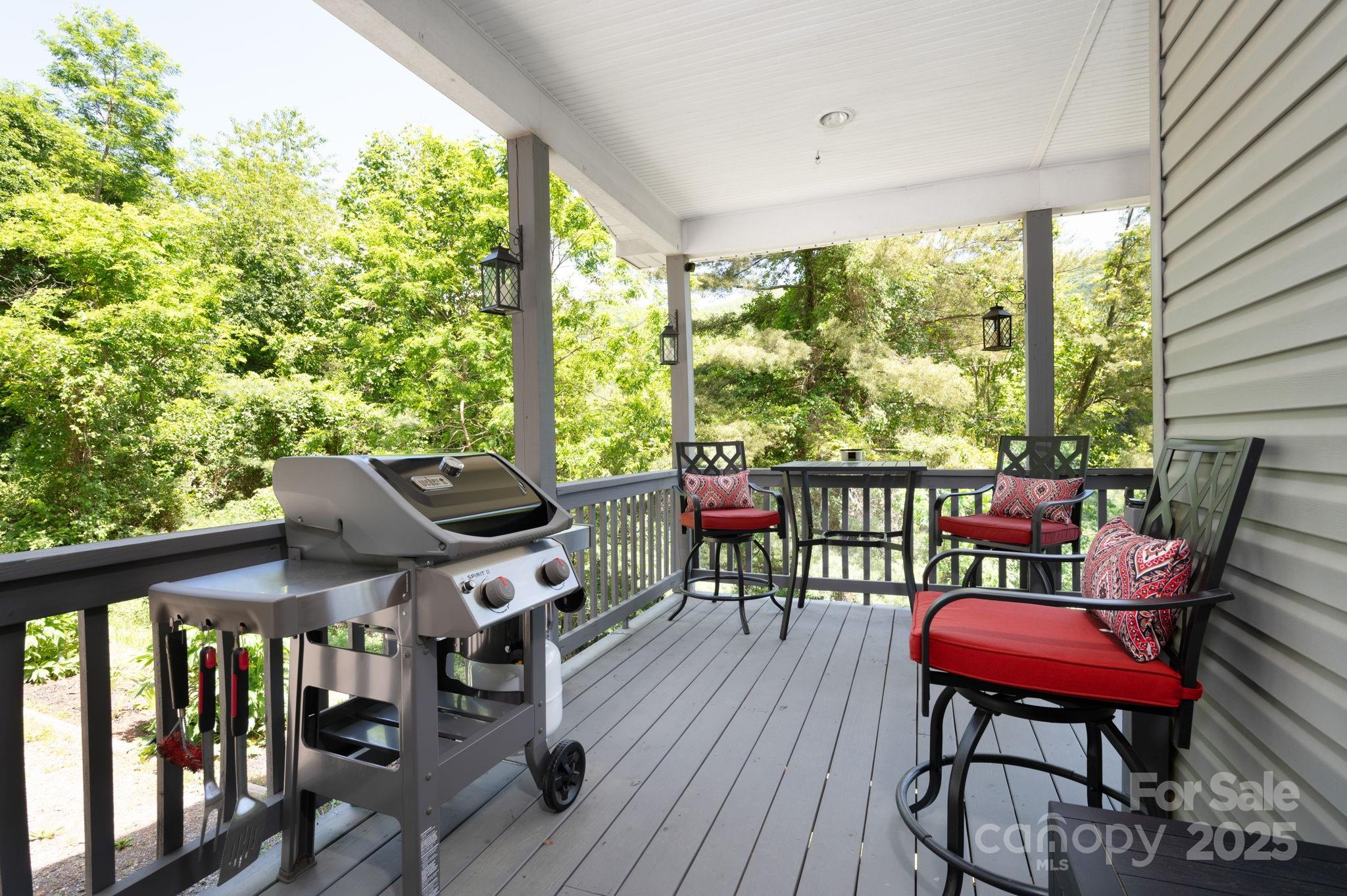 174 Diamond Point Canton, NC 28716 - Photo 6 of 30 a view of a chairs and table in patio