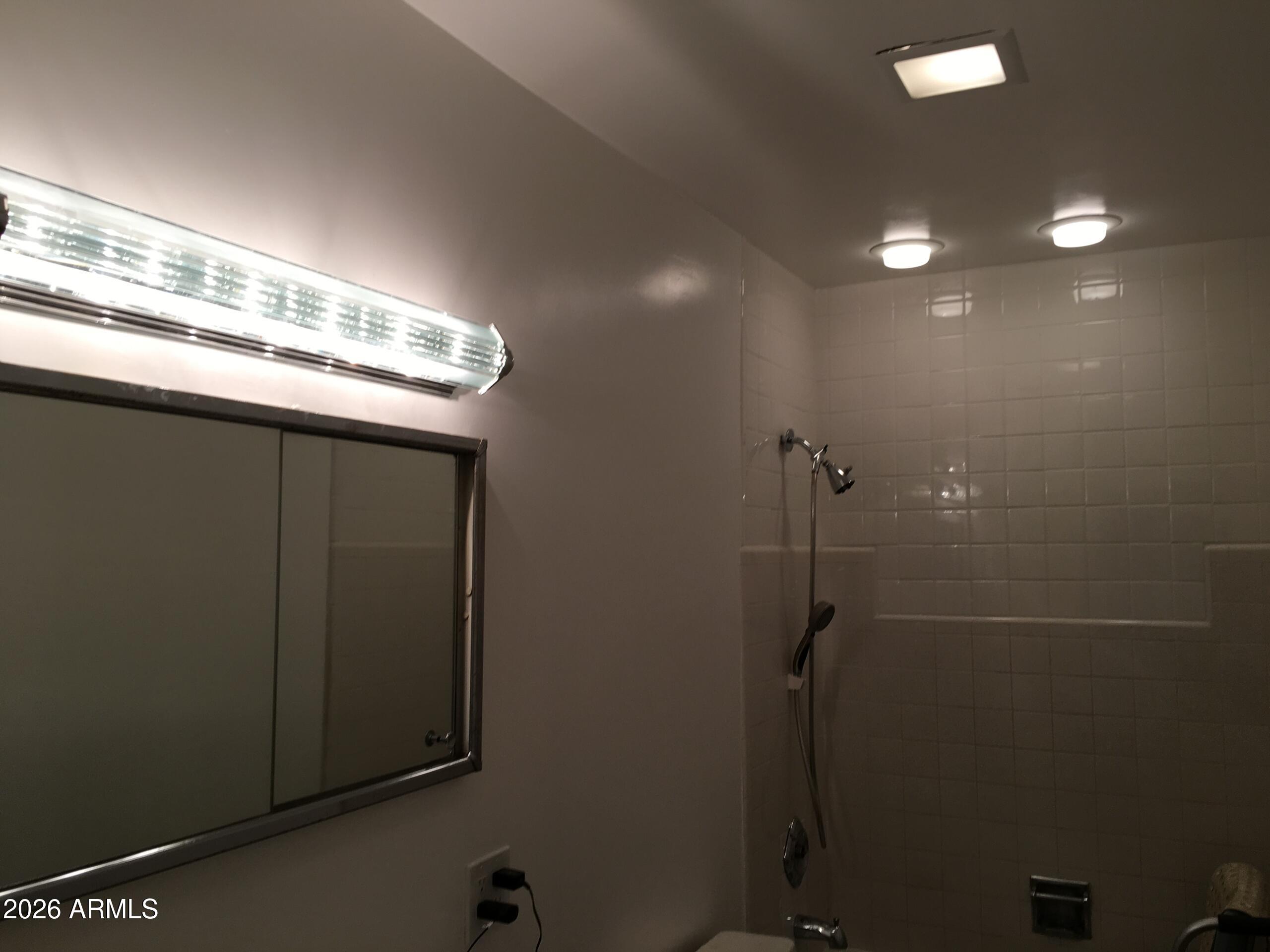 323 East Rose Lane Phoenix, AZ 85012 - Photo 19 of 20 a bathroom with a shower