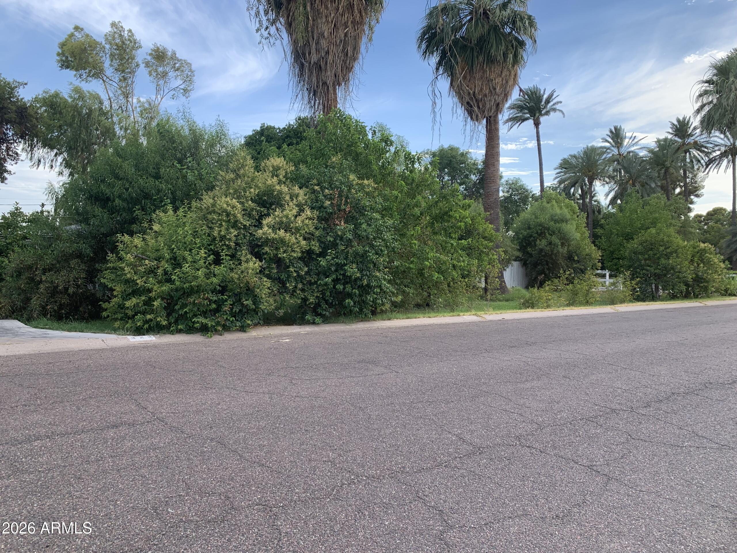 323 East Rose Lane Phoenix, AZ 85012 - Photo 3 of 20 a view of a house with a street