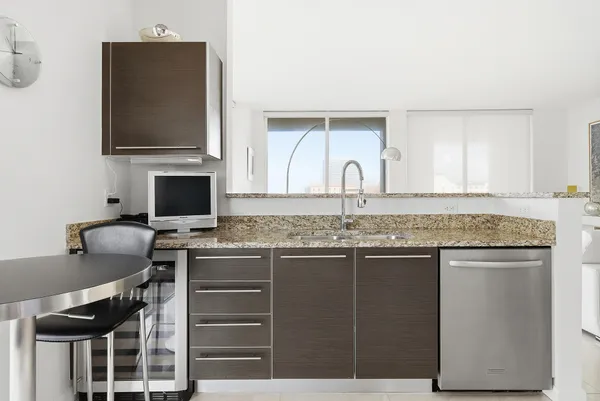 a kitchen with a stove and a microwave