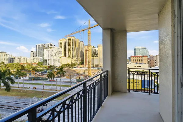 a view of a balcony with city view