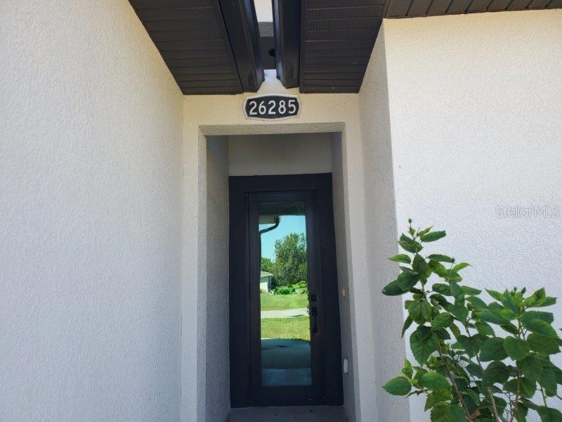 26285 Explorer Road Punta Gorda, FL 33983 - Photo 2 of 22 a close up of a wall