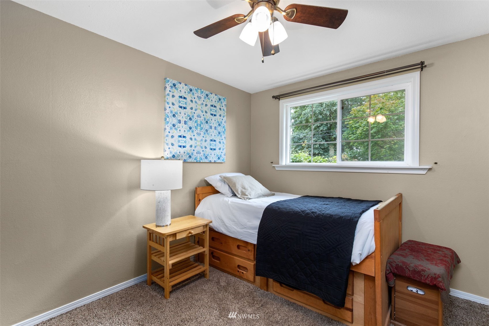 819 Duchess Road Bothell, WA 98012 - Photo 26 of 40 a bedroom with a bed and a window