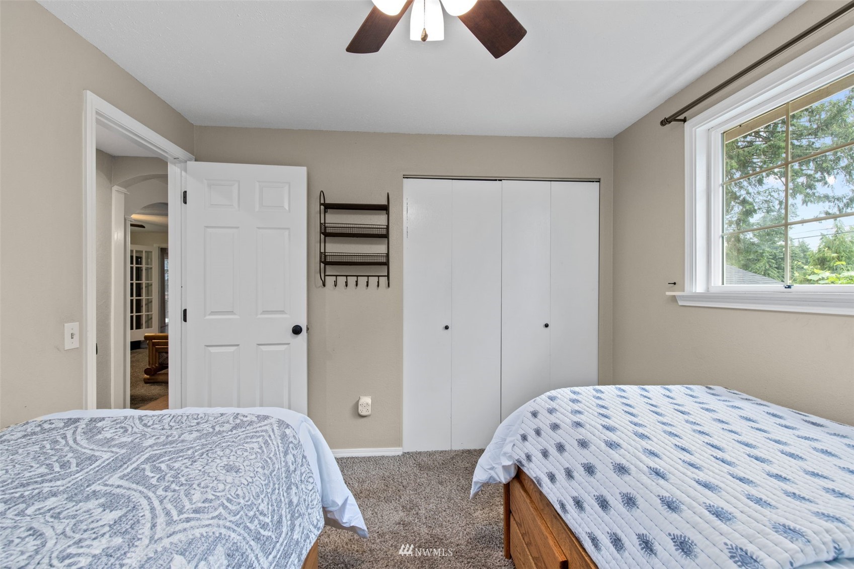 819 Duchess Road Bothell, WA 98012 - Photo 30 of 40 a bedroom with a bed and a window