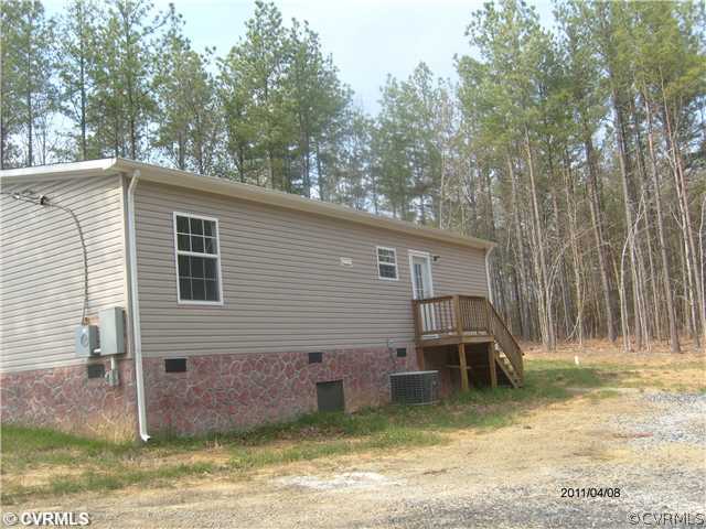 3430 Andersonville Road Dillwyn, VA 23936 - Photo 9 of 12 a front view of a house with a yard