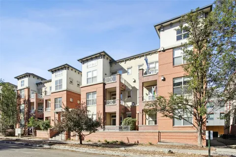 a front view of a building with street view
