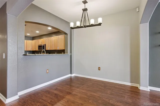 a view of a kitchen with a sink and dishwasher in it