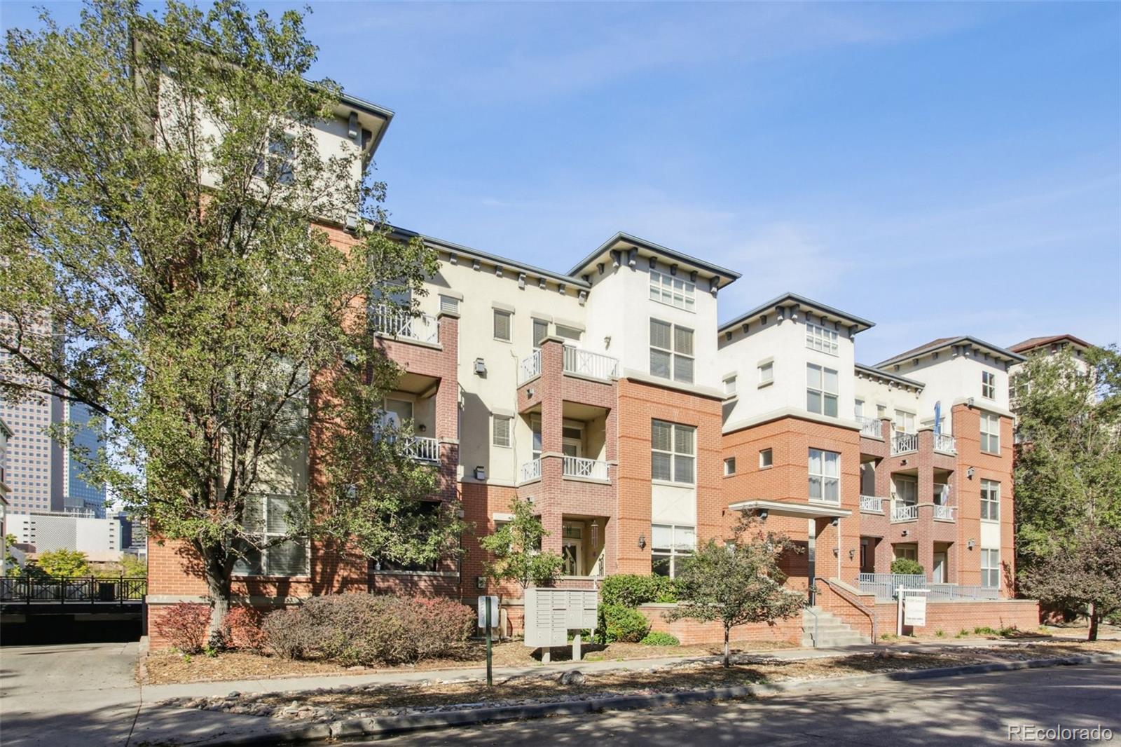 1747 Pearl Street, Unit 106 Denver, CO 80203 - Photo 2 of 26 a front view of a multi story building