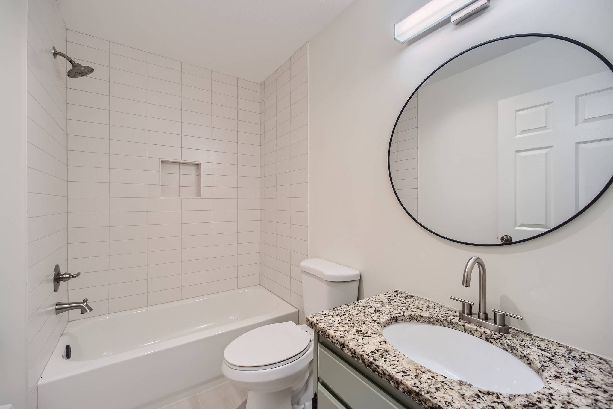 417 Hill Road Nashville, TN 37027 - Photo 16 of 27 a bathroom with a granite countertop sink mirror toilet and bathtub