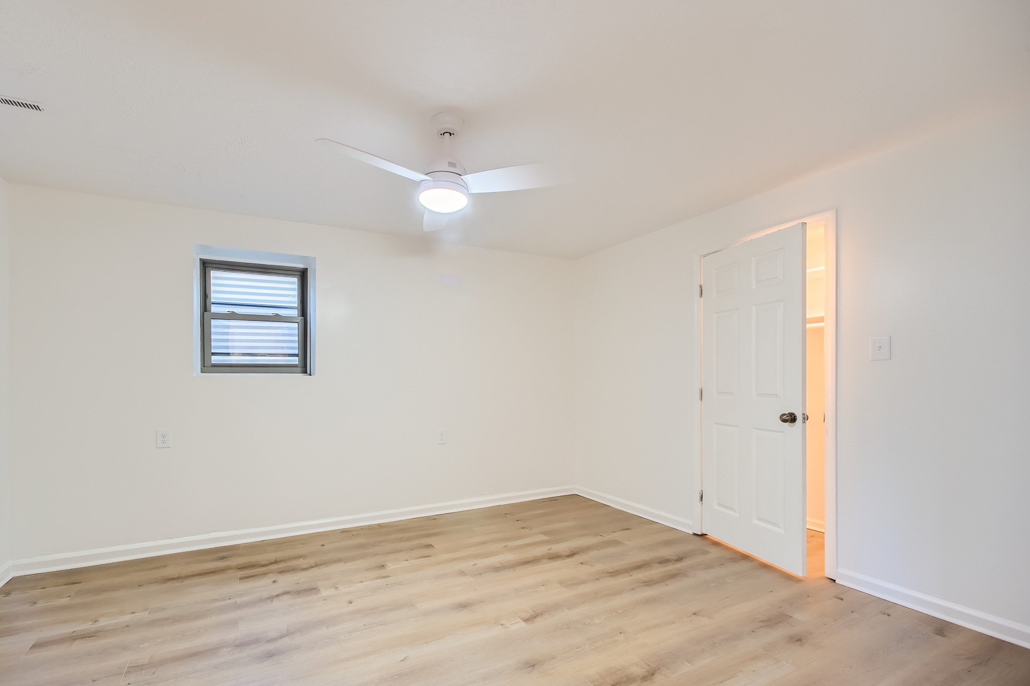 417 Hill Road Nashville, TN 37027 - Photo 17 of 27 an empty room with wooden floor and window