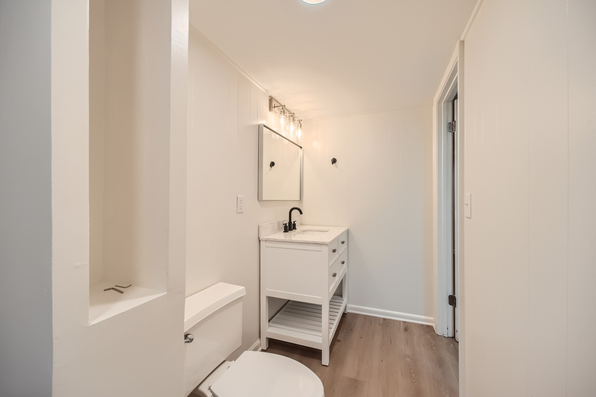 417 Hill Road Nashville, TN 37027 - Photo 18 of 27 a bathroom with a sink a toilet and tub