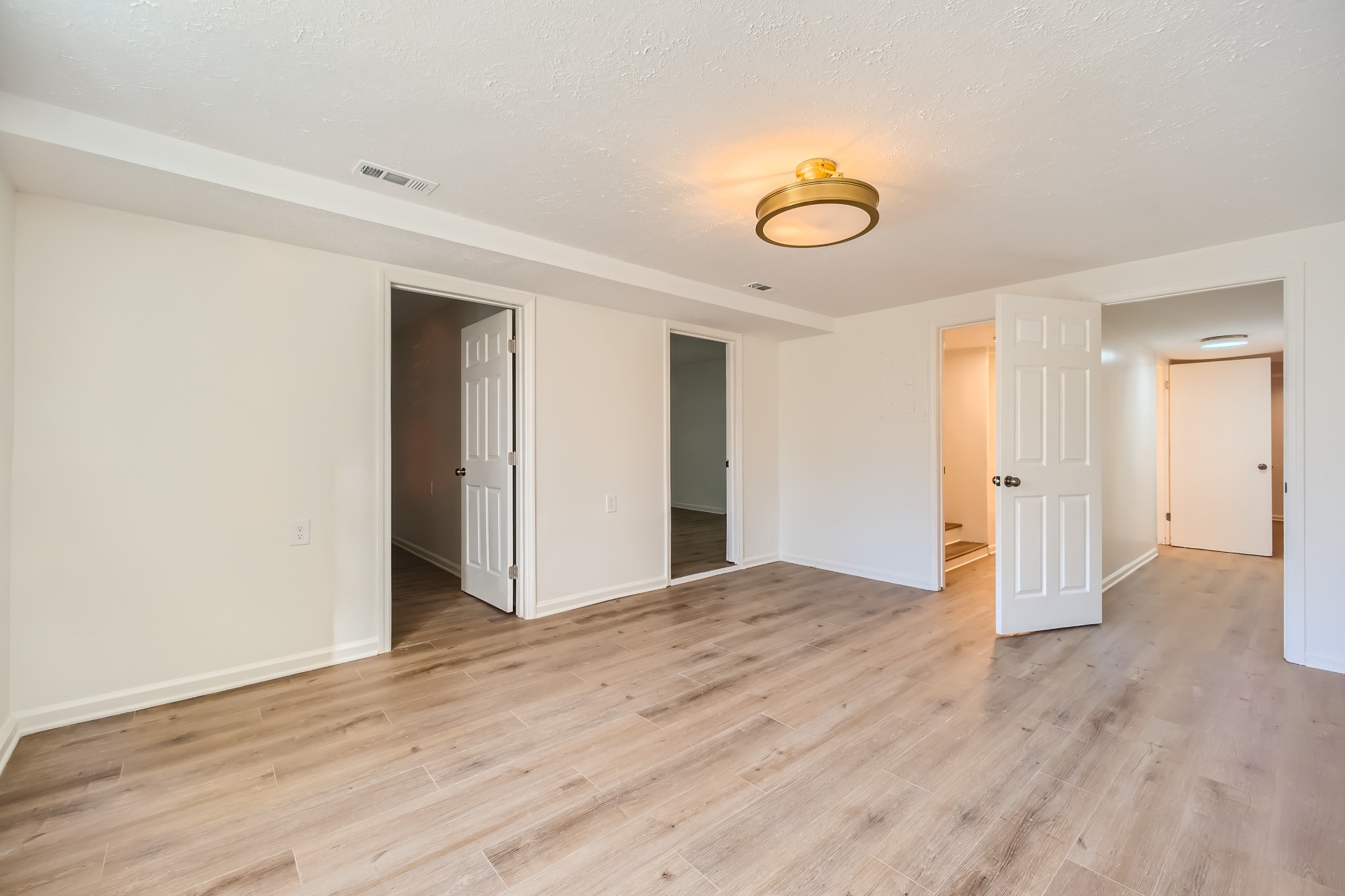 417 Hill Road Nashville, TN 37027 - Photo 23 of 27 a view of an empty room with wooden floor and window