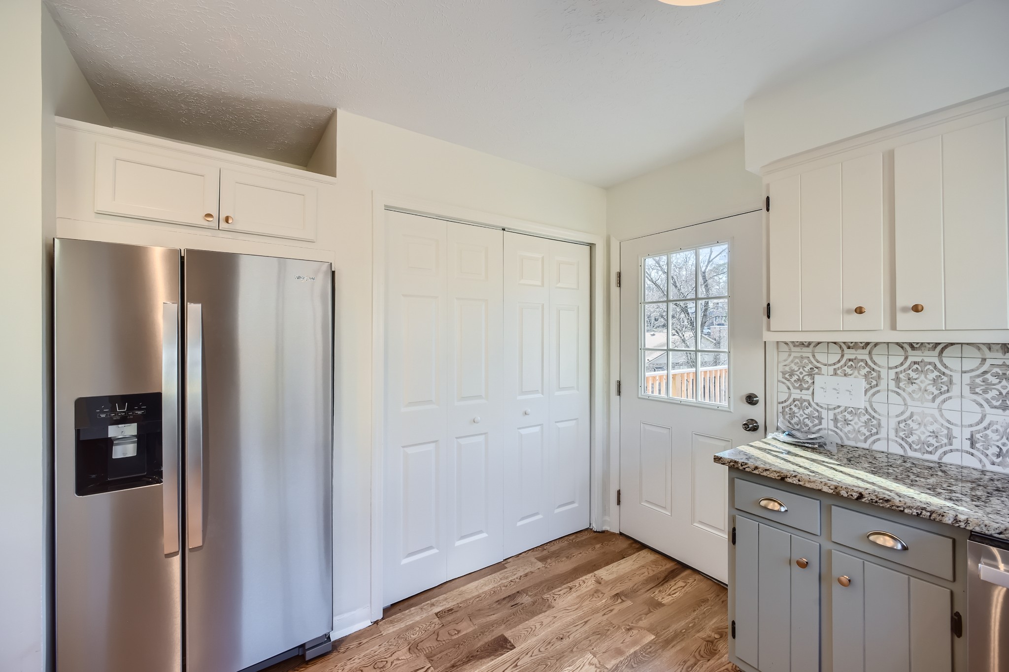 417 Hill Road Nashville, TN 37027 - Photo 10 of 27 a kitchen with stainless steel appliances granite countertop a refrigerator and a sink