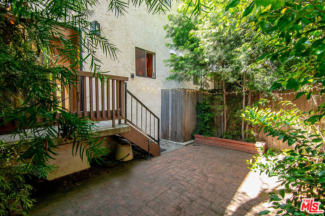 2216 South Bentley Avenue, Unit 10 Los Angeles, CA 90064 - Photo 37 of 40 a view of a garden with pathway
