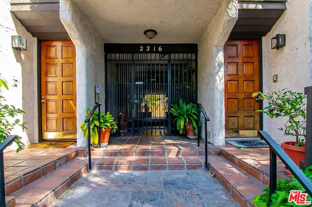 a view of entrance gate of the house