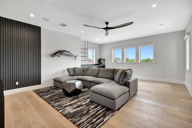 an aerial view of a house with a lake view