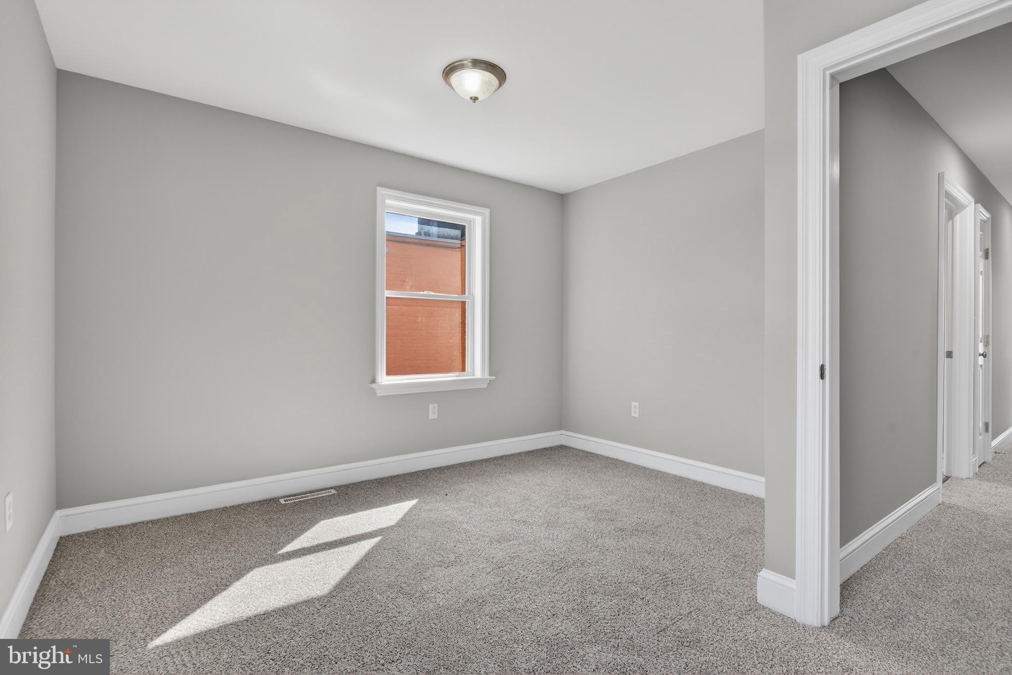 637 East Fulton Street Lancaster, PA 17602 - Photo 15 of 28 a view of an empty room with a window