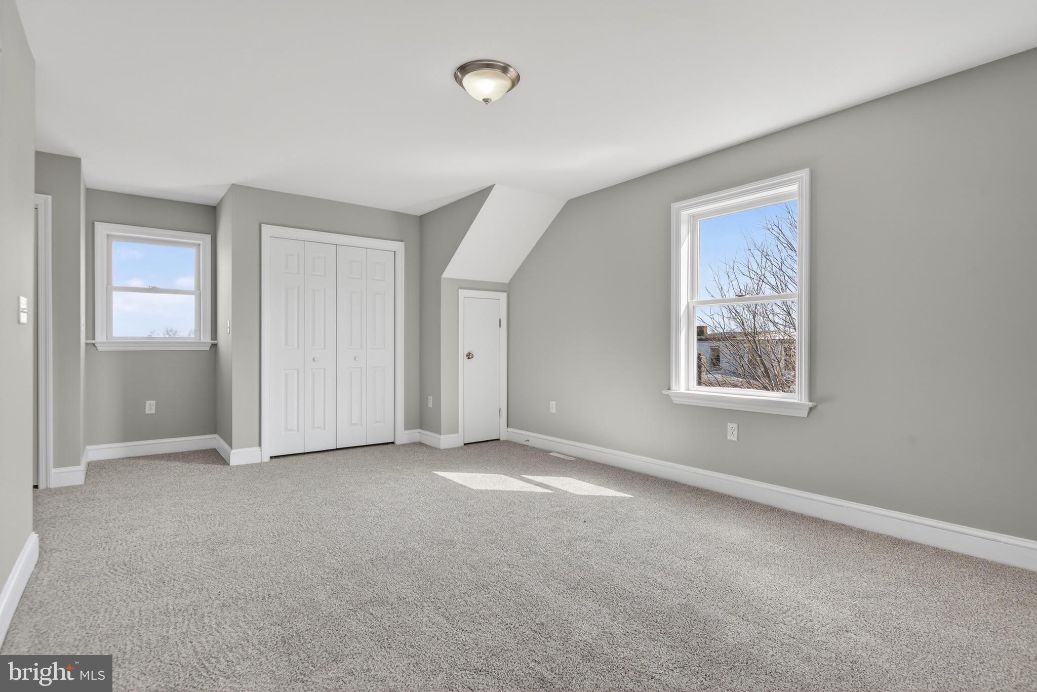 637 East Fulton Street Lancaster, PA 17602 - Photo 21 of 28 an empty room with windows and closet
