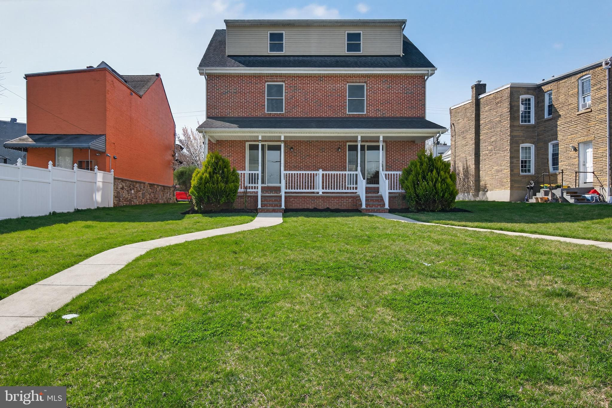 637 East Fulton Street Lancaster, PA 17602 - Photo 27 of 28 a front view of a house with a yard