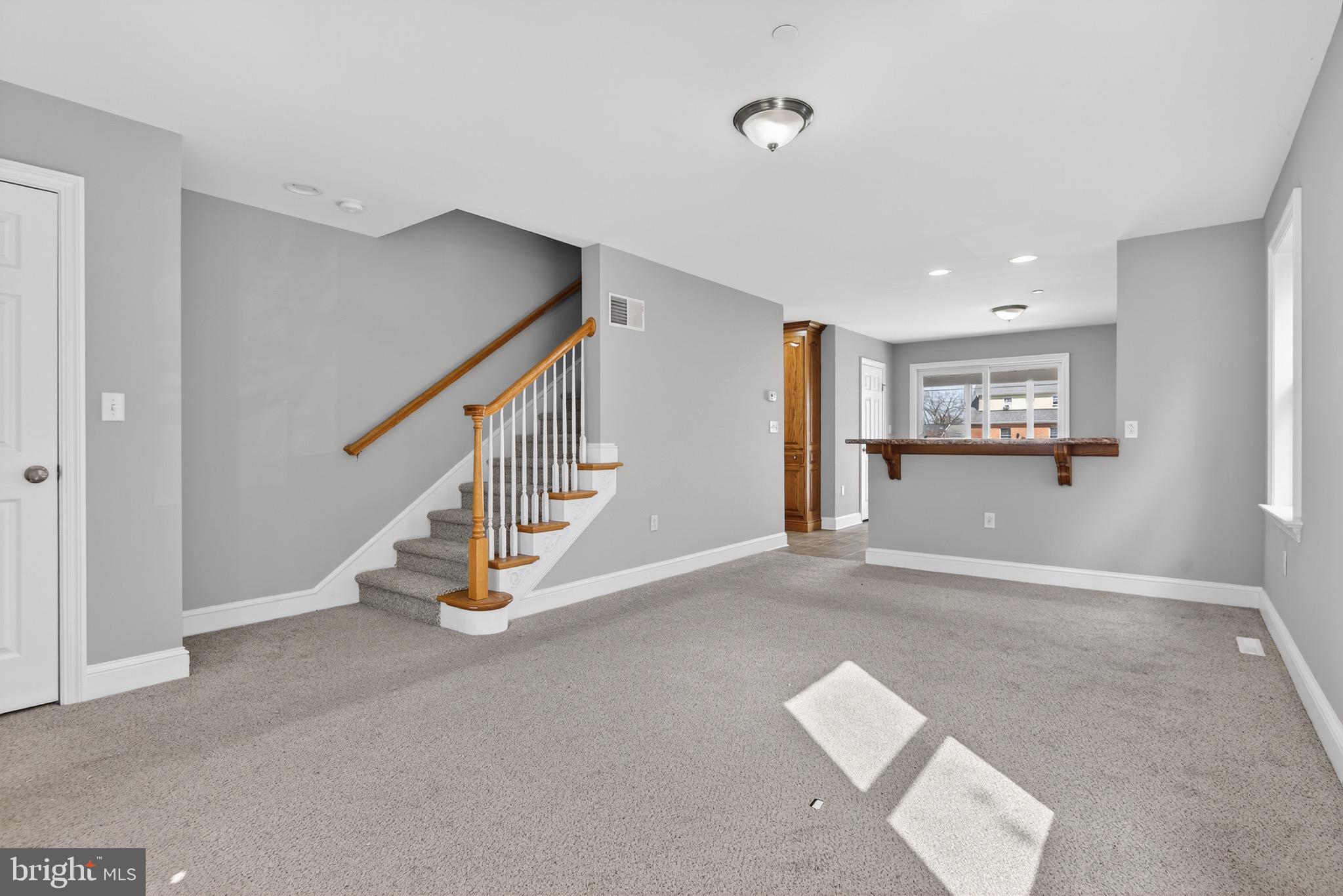 637 East Fulton Street Lancaster, PA 17602 - Photo 6 of 28 a view of a hallway with staircase