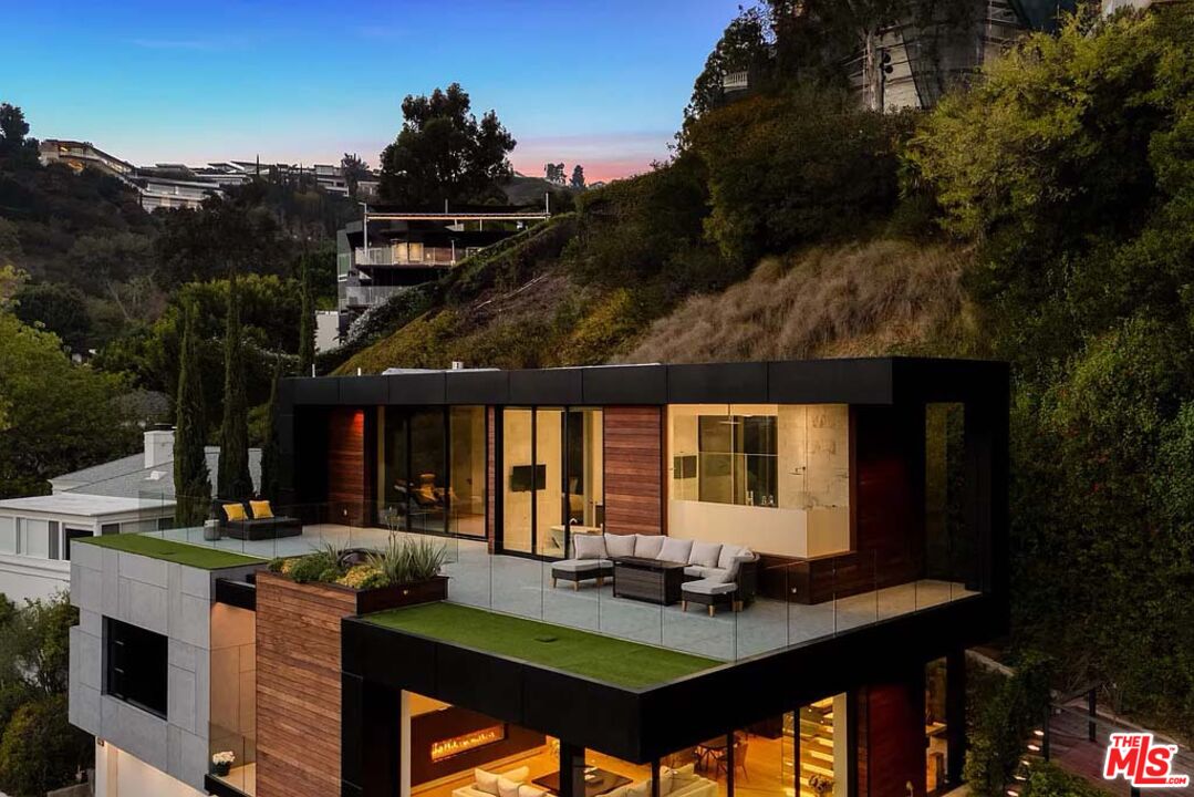1331 Belfast Drive Los Angeles, CA 90069 - Photo 2 of 25 a view of house with backyard and outdoor seating