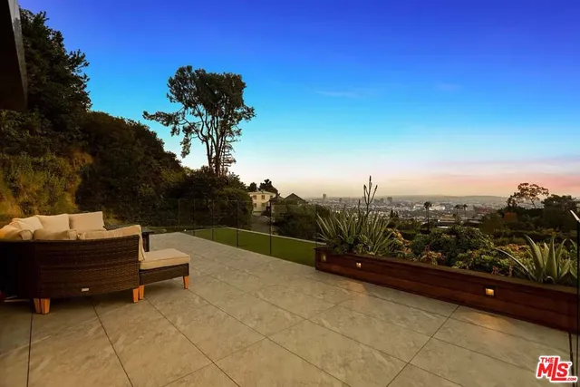a view of a terrace with sitting area