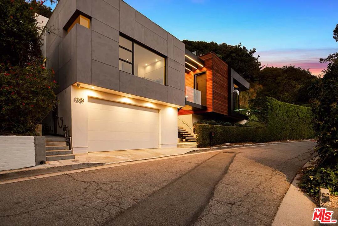 1331 Belfast Drive Los Angeles, CA 90069 - Photo 5 of 25 a view of a street with buildings in the background